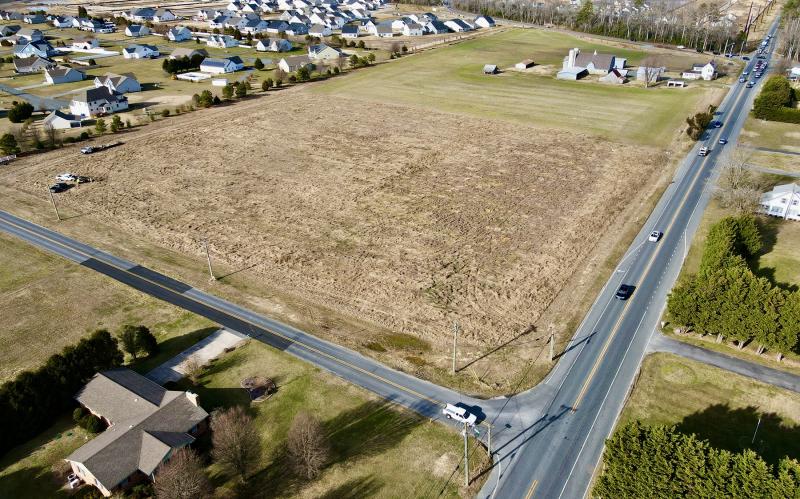 Work is scheduled to begin this spring on the first phase of construction of Chapel Branch Apartments at the intersection of Route 24, right, and Dorman Road, left, between Lewes and Long Neck. NICK ROTH PHOTO